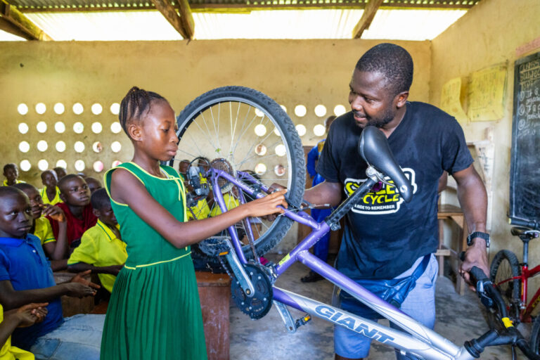 Beneficiaries Mohamed Fofanah, Isatu Bangura and Principal John Brima Tholley